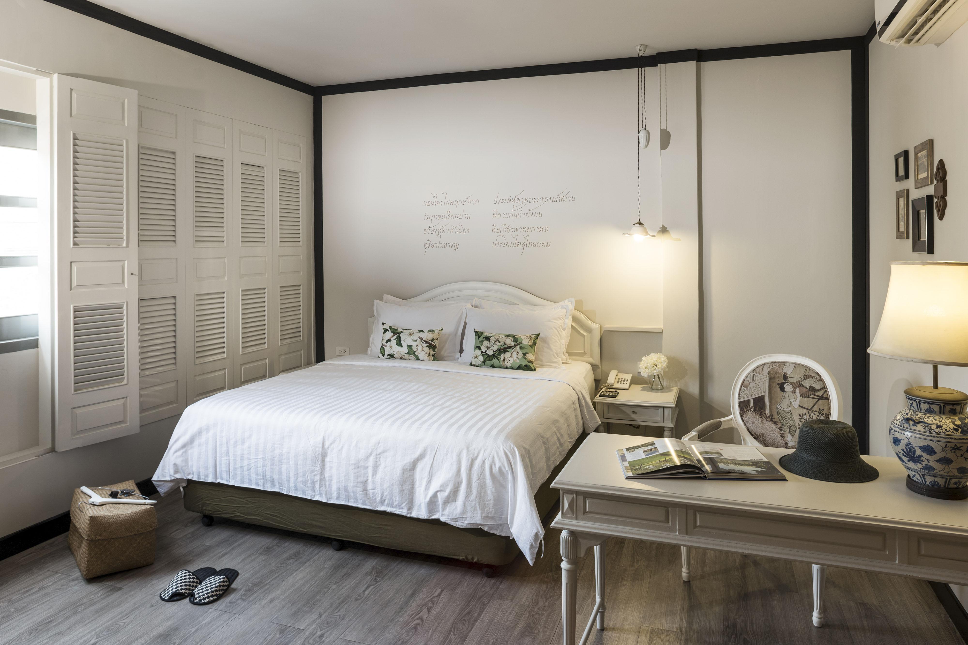 The Raweekanlaya Bangkok Exterior foto A bedroom at The Library